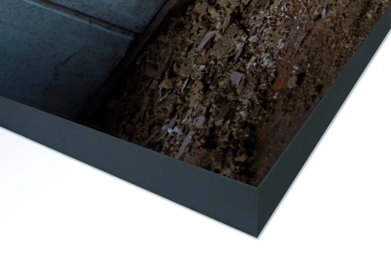 Close up textieldoek gemonteerd in frame zwart